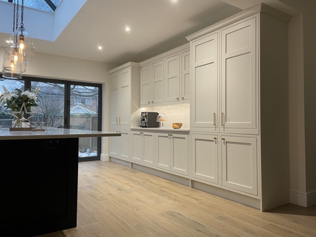 Hand crafted cream kitchen, with shaker style doors and tall cabinates.